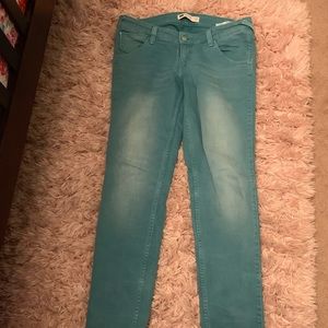 Levi’s low rise teal green skinny jeans